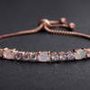 Fiery Opal Adjustable Tennis Bracelet Made with Swarovski Elements in Gold Plating by Nina Grace